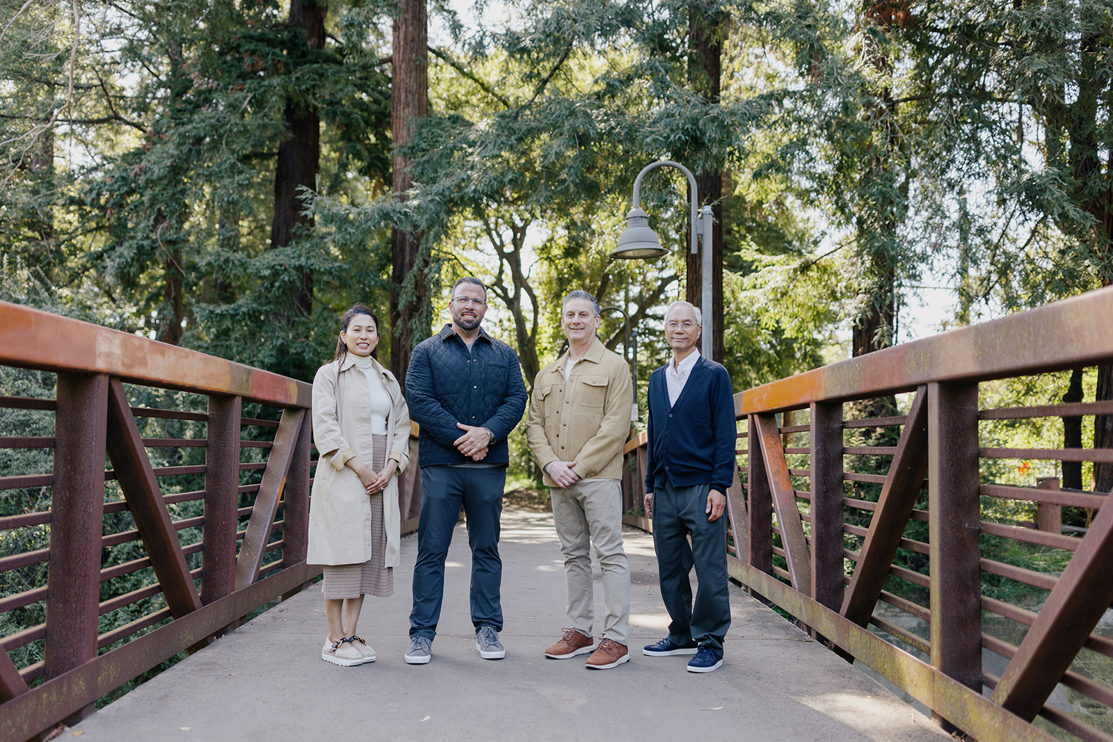 The Phases Financial Group's Leadership team poses outside their offices in Palo Alto, CA